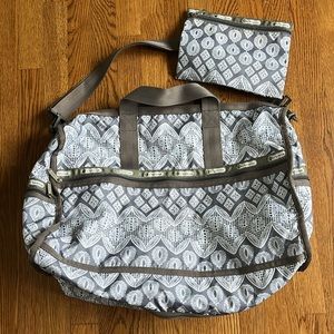 LeSportsac Duffle Weekender Lg Travel Bag Travel Poster Fun Print w/cosm…